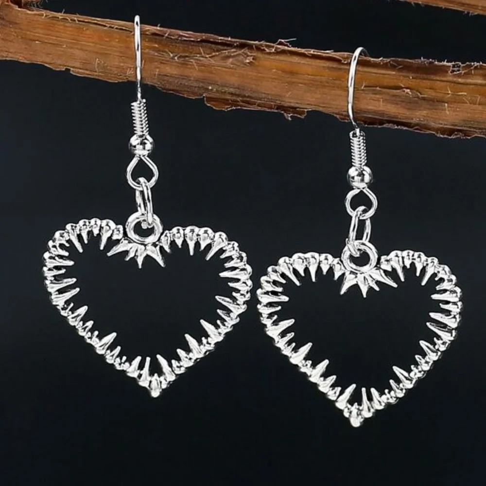 Any 3/$25! Silver Barbed Heart Drop Earrings - Picture 1 of 6
